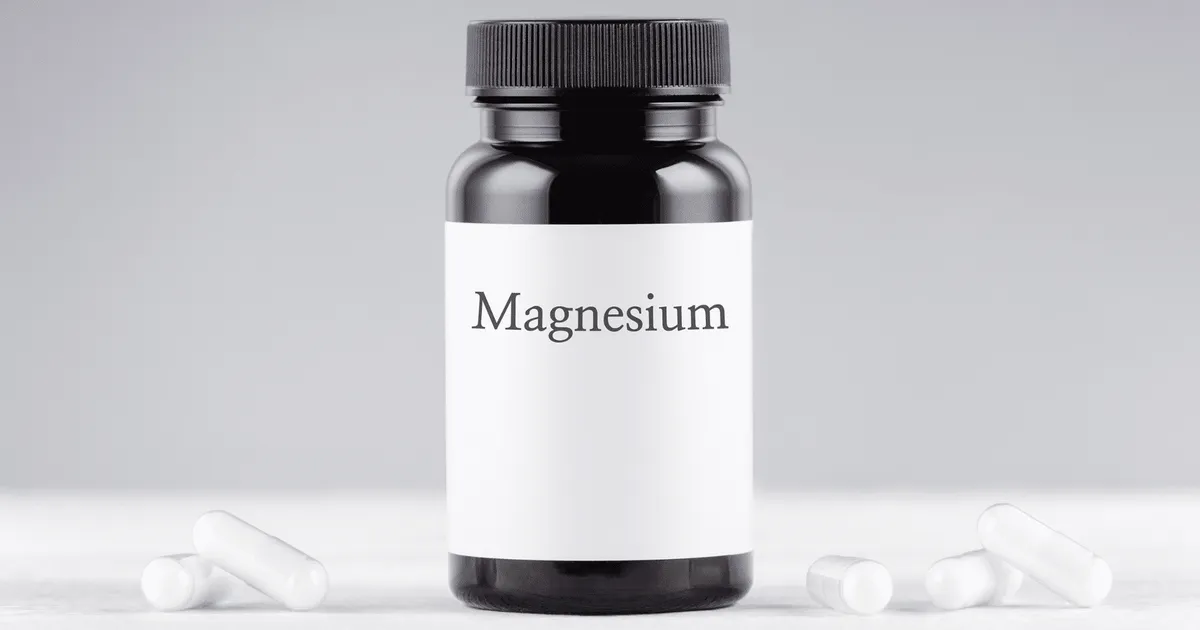 pill bottle with a white label that says magnesium